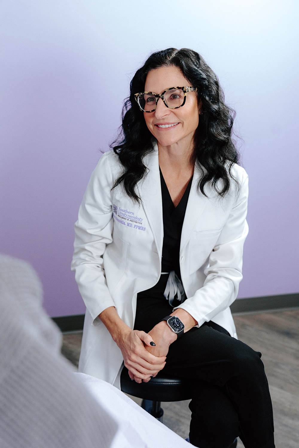 Couple joyfully walking down the street together.
